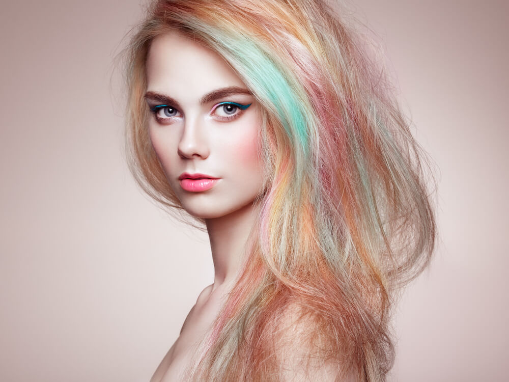 Woman with rainbow colored hair
