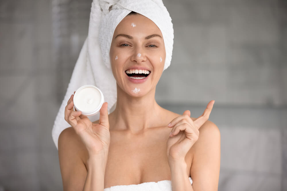 woman happy skincare